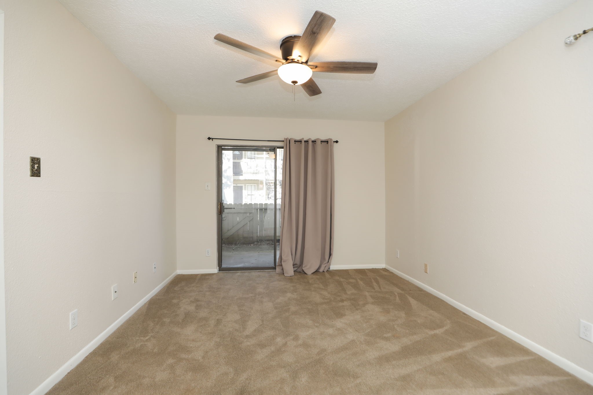 17401 Red Oak Drive, Unit 97 Houston, TX 77090 - Photo 20 of 37 an empty room with closet and windows