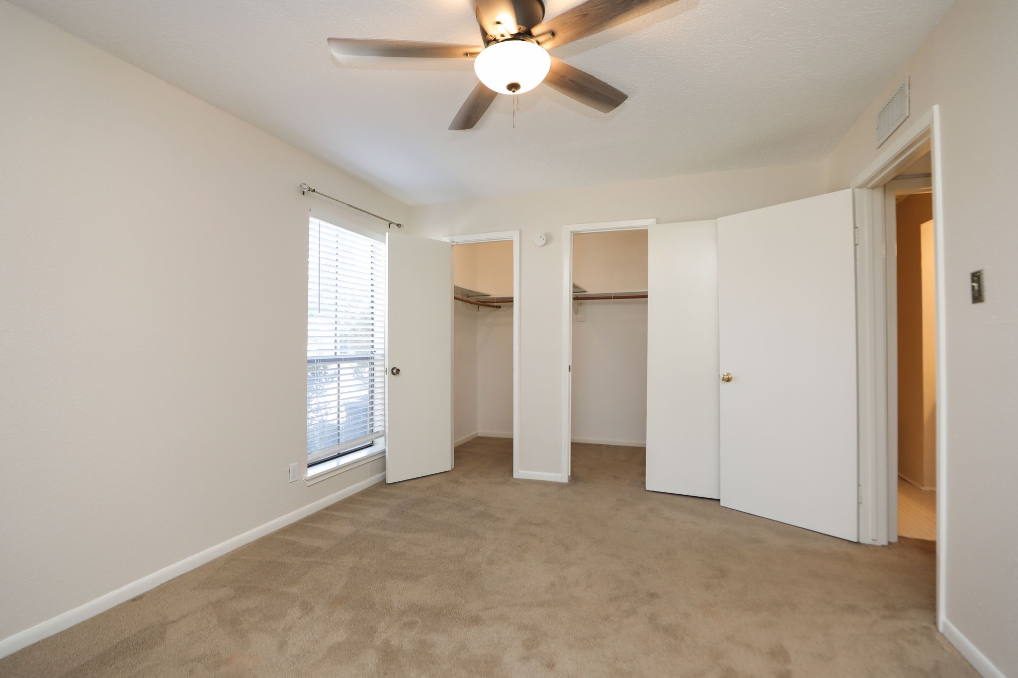 17401 Red Oak Drive, Unit 97 Houston, TX 77090 - Photo 22 of 37 a view of an empty room with a window