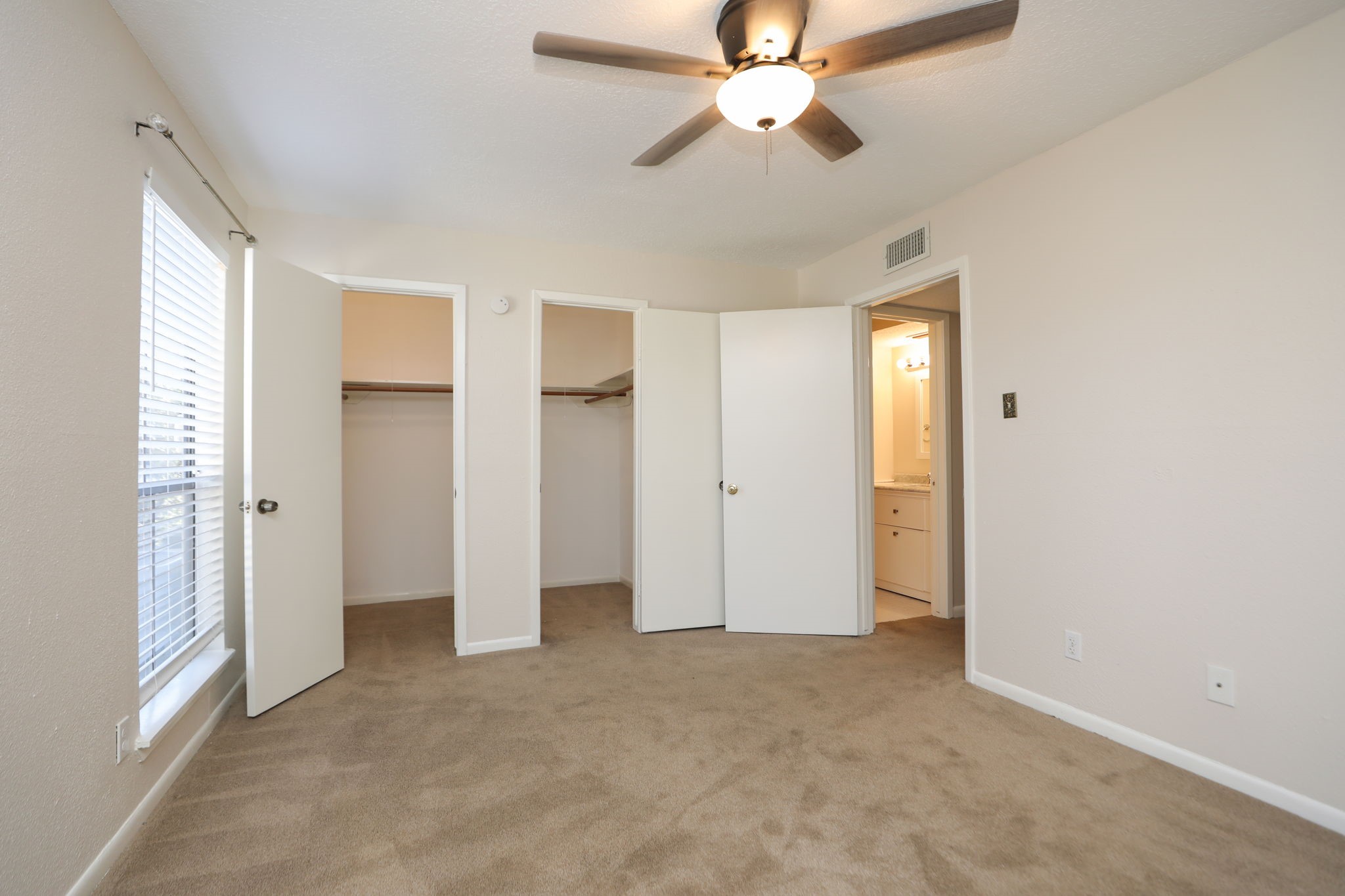 17401 Red Oak Drive, Unit 97 Houston, TX 77090 - Photo 23 of 37 a view of an empty room with a window