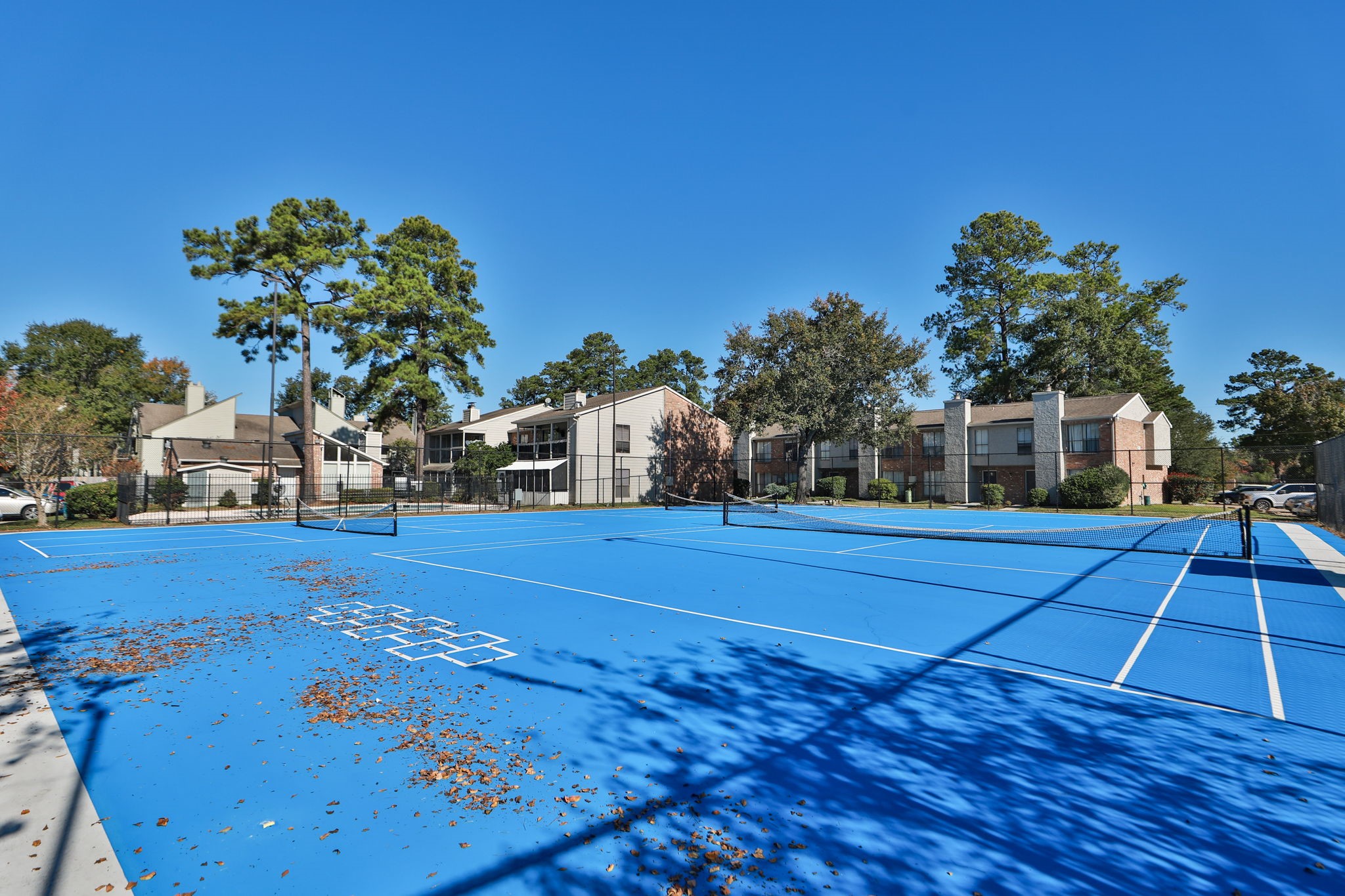 17401 Red Oak Drive, Unit 97 Houston, TX 77090 - Photo 34 of 37 a swimming pool with yard in front of it