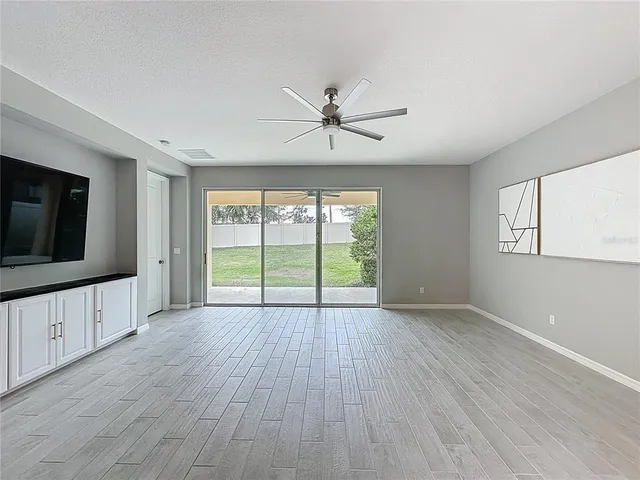 a view of a workspace with furniture