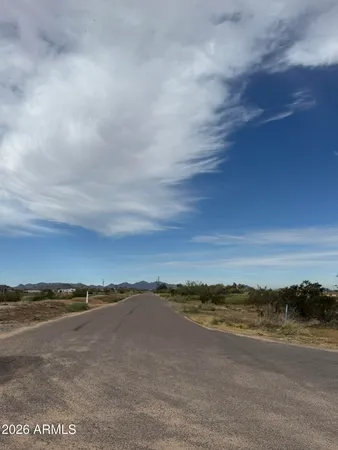 a view of an ocean and mountain