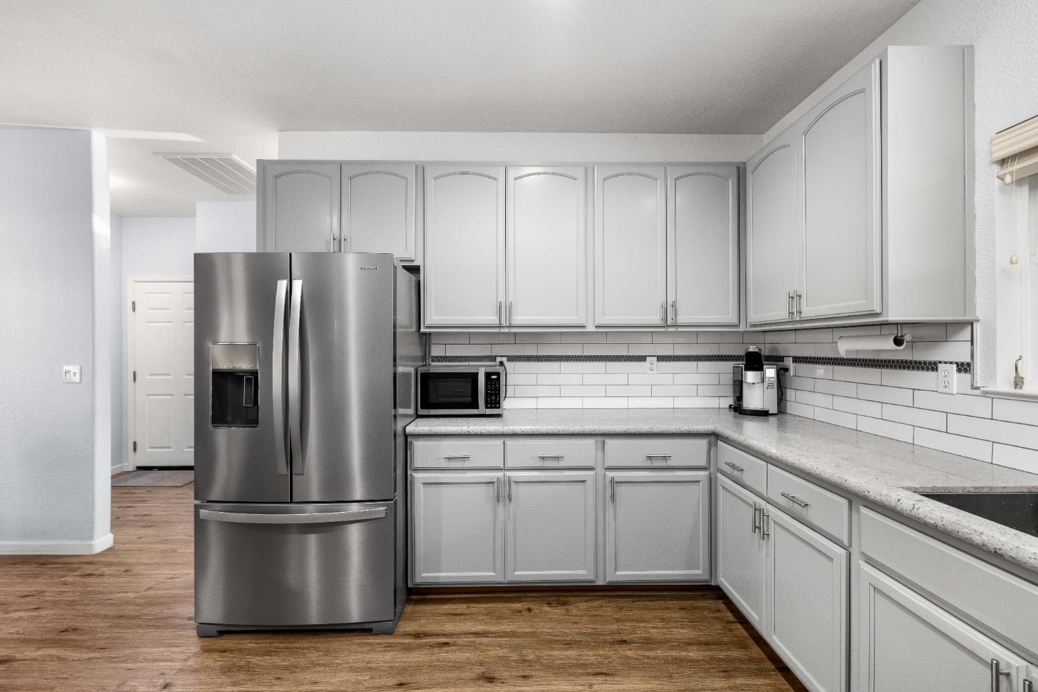 6843 Log Cabin Lane Placerville, CA 95667 - Photo 25 of 49 a kitchen with a refrigerator sink and cabinets
