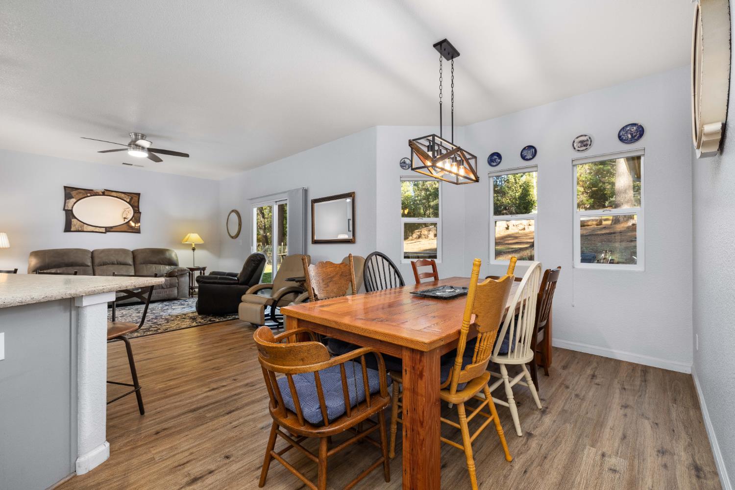 6843 Log Cabin Lane Placerville, CA 95667 - Photo 28 of 49 a view of a dining room with furniture window and wooden floor