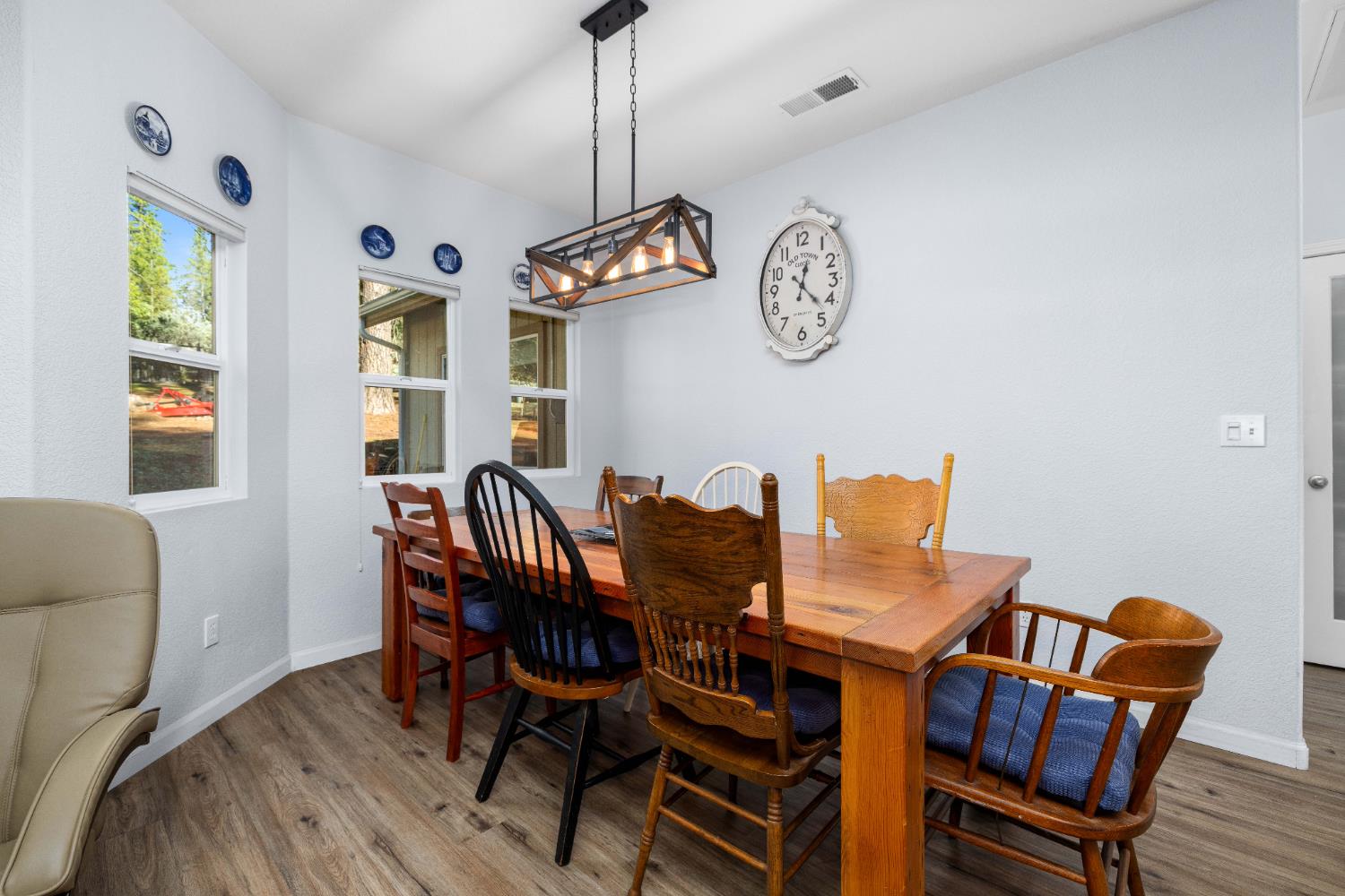 6843 Log Cabin Lane Placerville, CA 95667 - Photo 29 of 49 a view of a dining room with furniture window and wooden floor