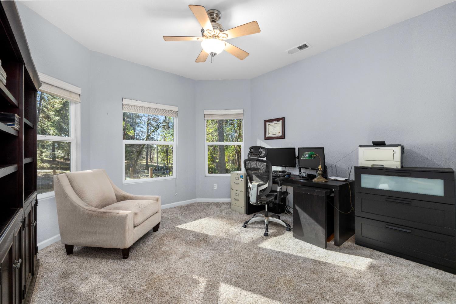 6843 Log Cabin Lane Placerville, CA 95667 - Photo 30 of 49 a living room with furniture and a flat screen tv