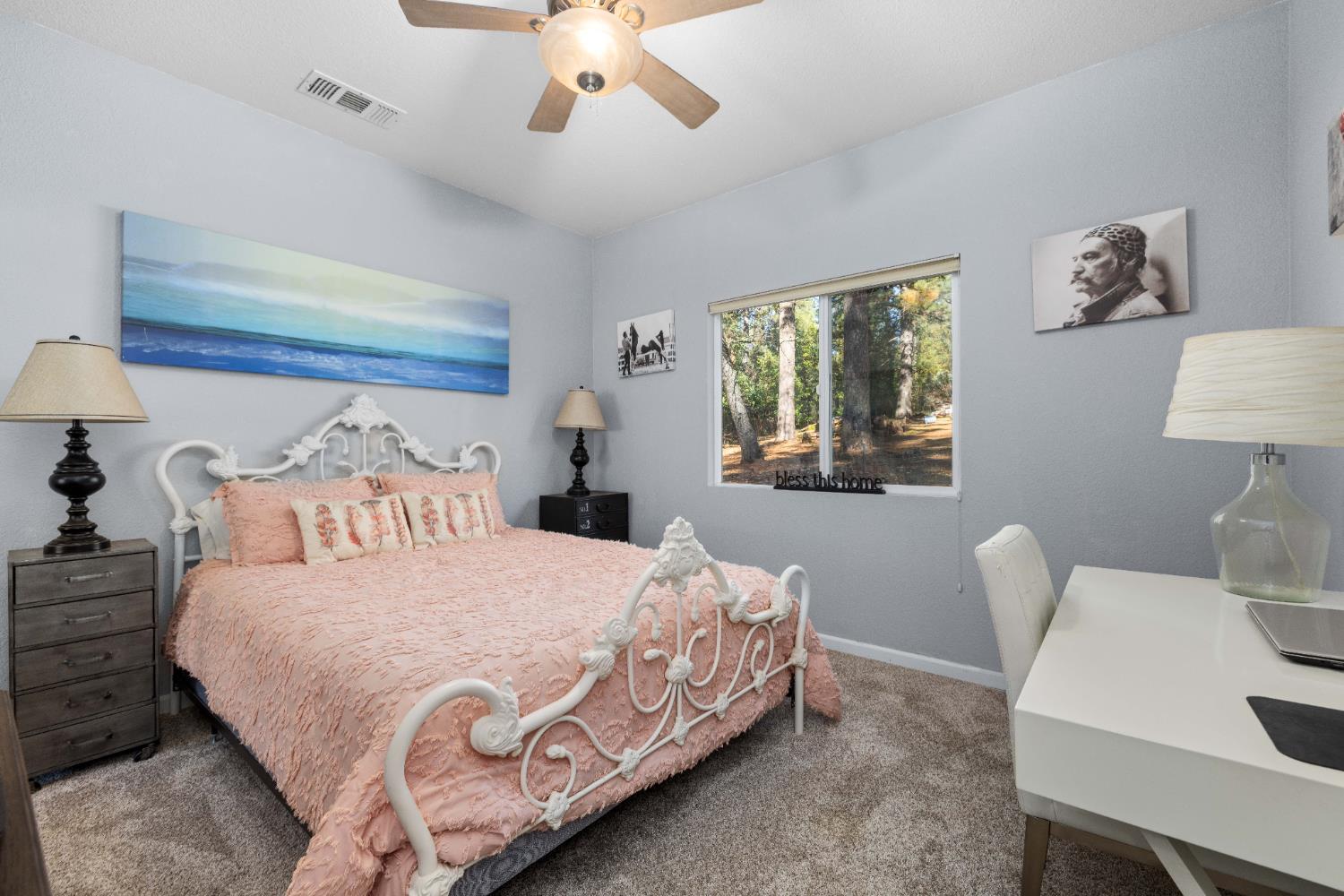 6843 Log Cabin Lane Placerville, CA 95667 - Photo 35 of 49 a bedroom with a bed and a table