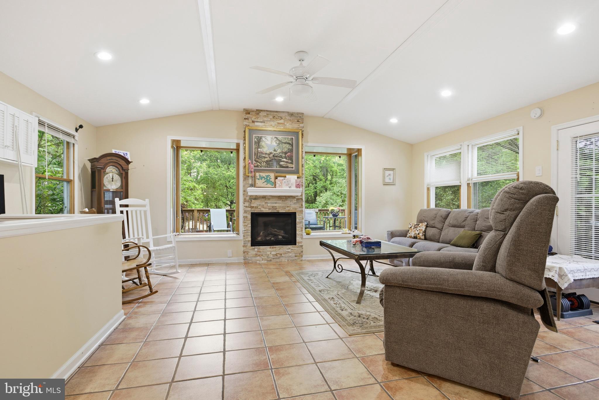 301 Riverview Road Swarthmore, PA 19081 - Photo 12 of 46 a living room with furniture and a fireplace
