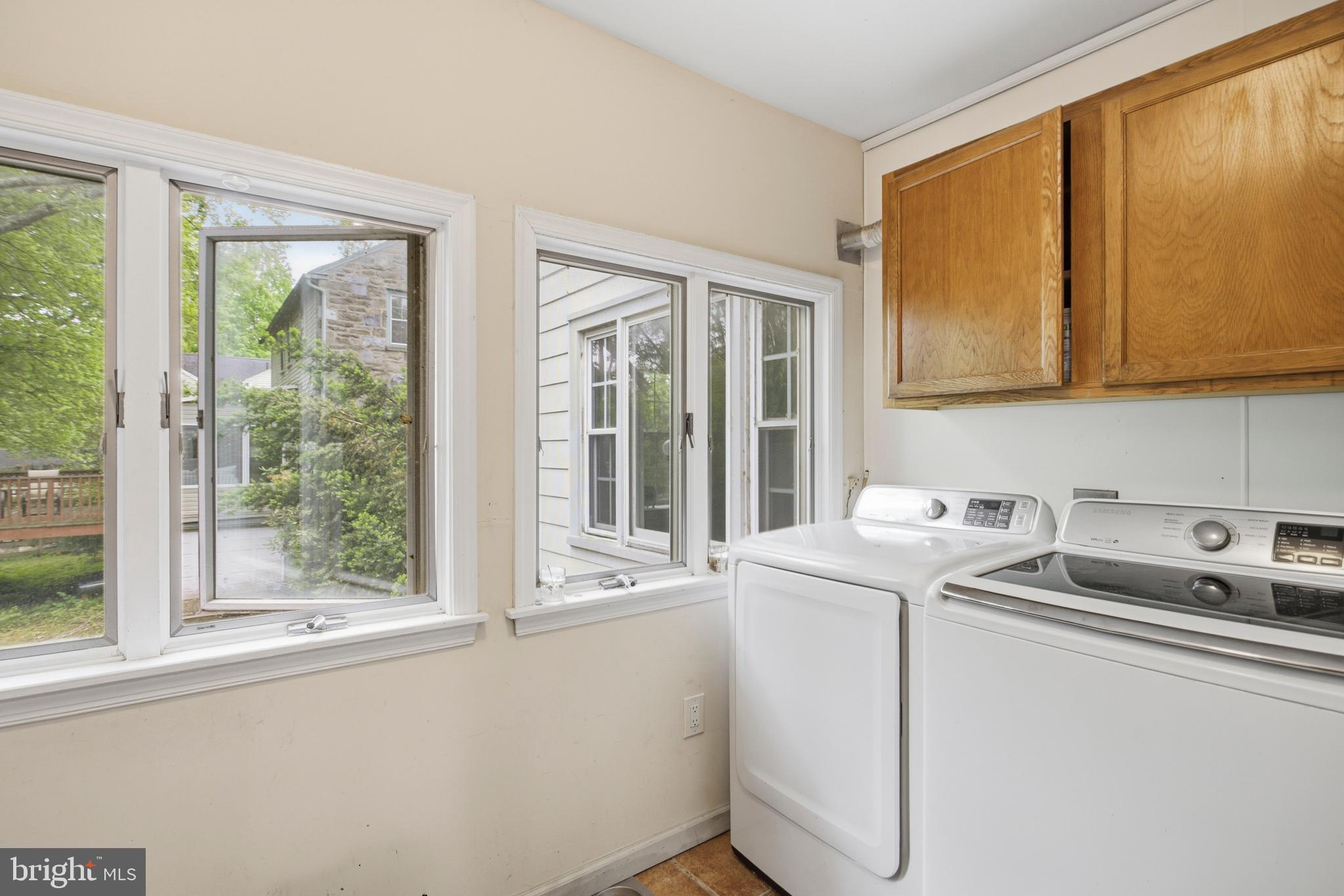 301 Riverview Road Swarthmore, PA 19081 - Photo 15 of 46 a utility room with dryer and washer