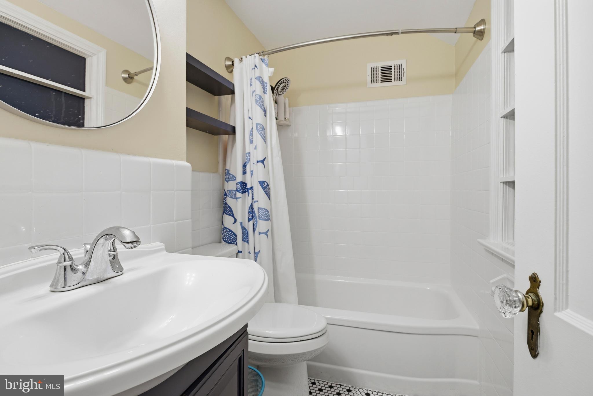 301 Riverview Road Swarthmore, PA 19081 - Photo 20 of 46 a bathroom with a sink toilet and shower