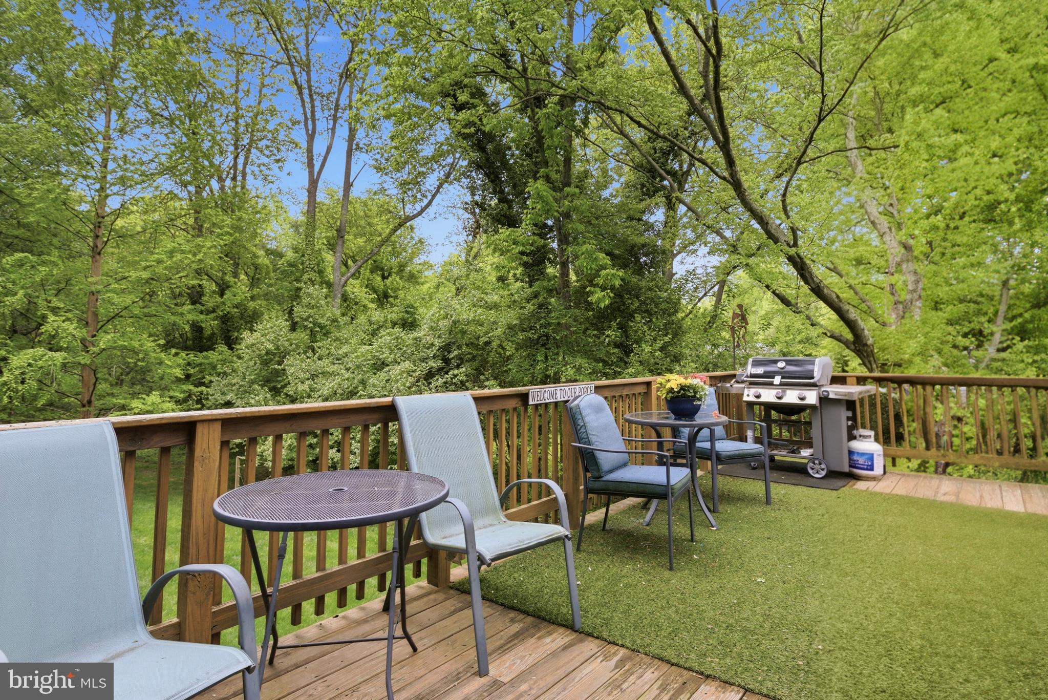 301 Riverview Road Swarthmore, PA 19081 - Photo 36 of 46 a backyard of a house with table and chairs