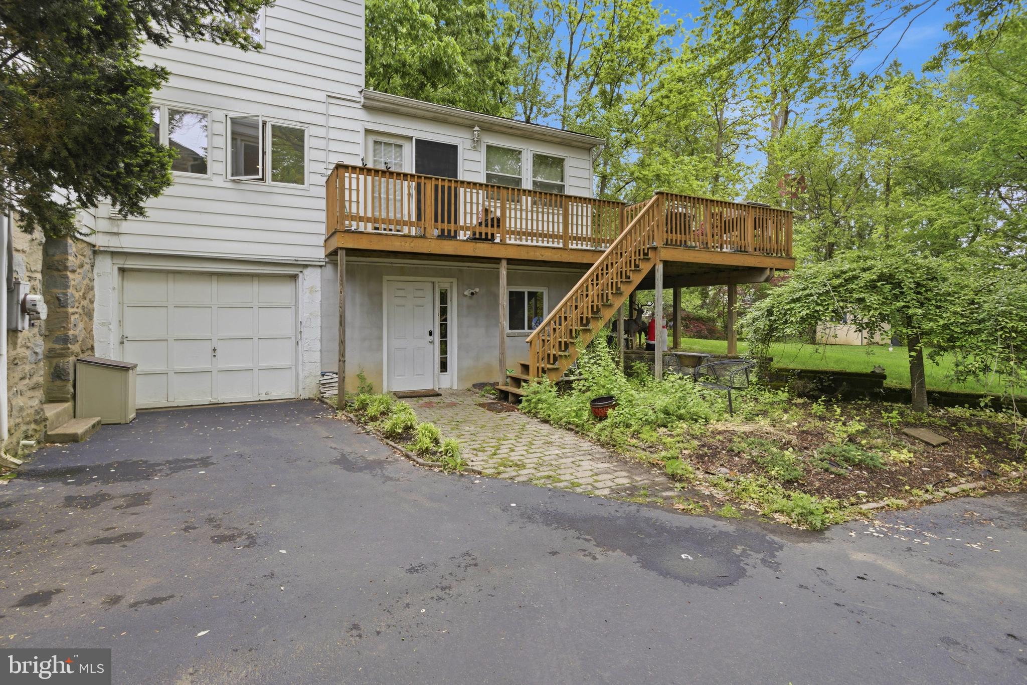 301 Riverview Road Swarthmore, PA 19081 - Photo 38 of 46 a front view of a house with a yard