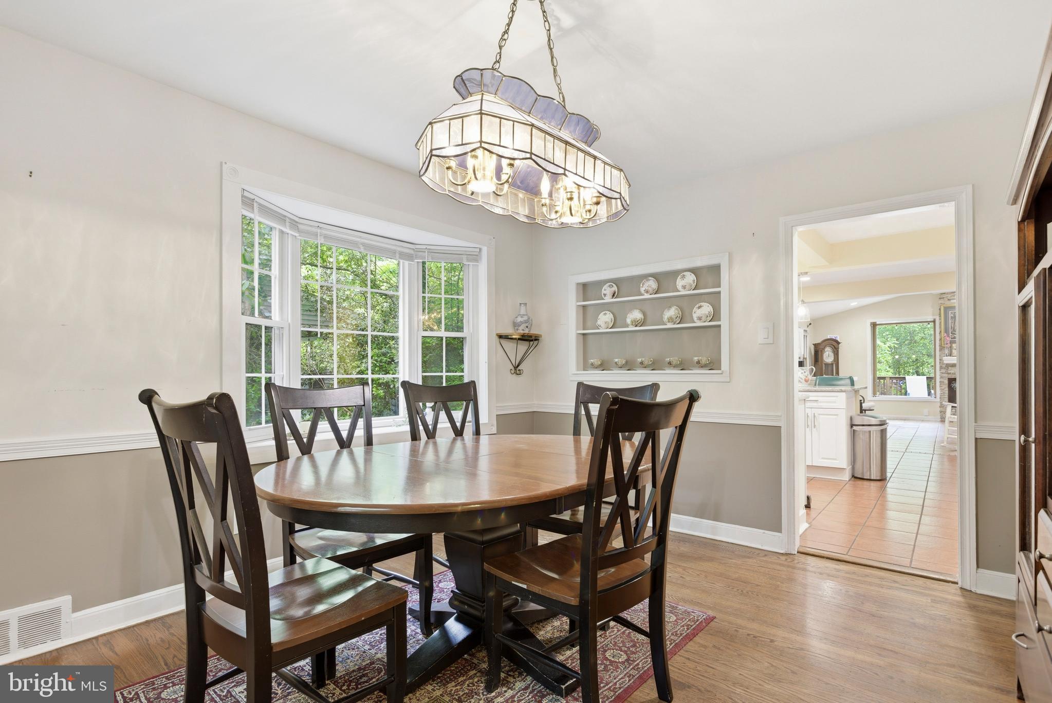 301 Riverview Road Swarthmore, PA 19081 - Photo 6 of 46 a view of a dining room with furniture window and wooden floor