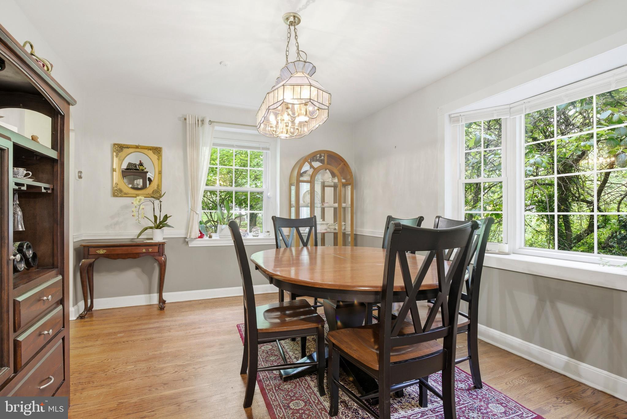 301 Riverview Road Swarthmore, PA 19081 - Photo 7 of 46 a view of a dining room with furniture window and wooden floor