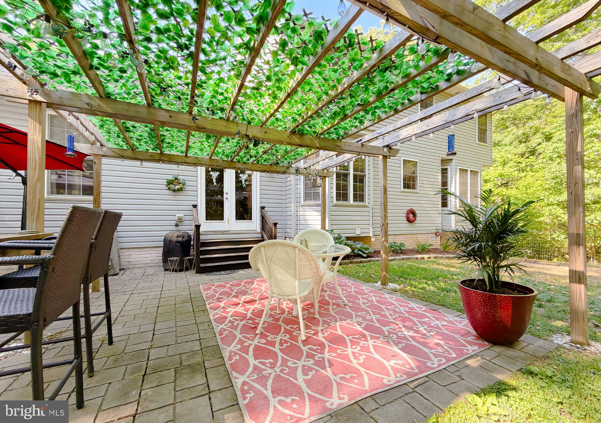 6020 Port Tobacco Road Indian Head, MD 20640 - Photo 7 of 59 Charming patio with lush greenery.