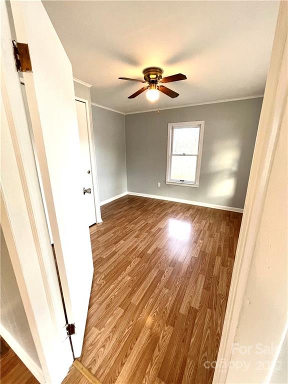 821 Sulphur Springs Road Hiddenite, NC 28636 - Photo 11 of 30 a view of a hallway with a window
