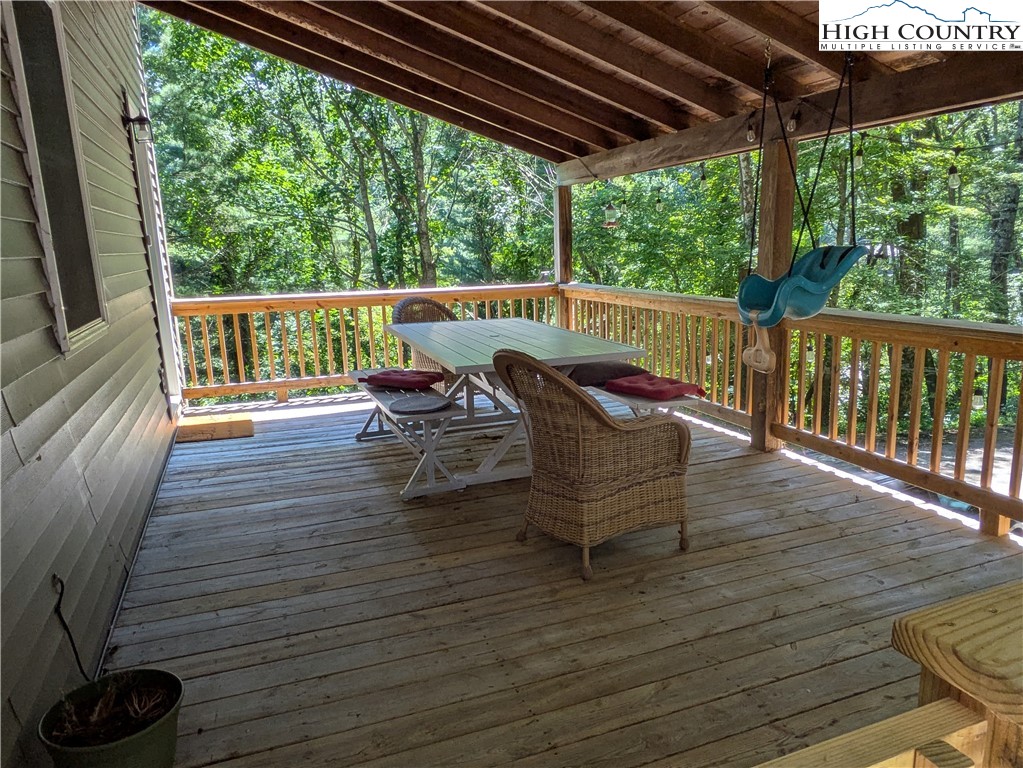 399 Ravens Ridge Circle Boone, NC 28607 - Photo 29 of 42 a view of sitting area with furniture and wooden floor