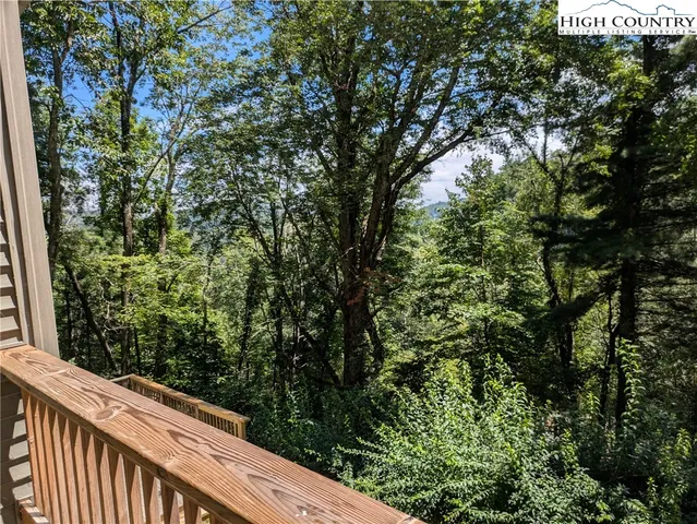 a balcony with an outdoor space