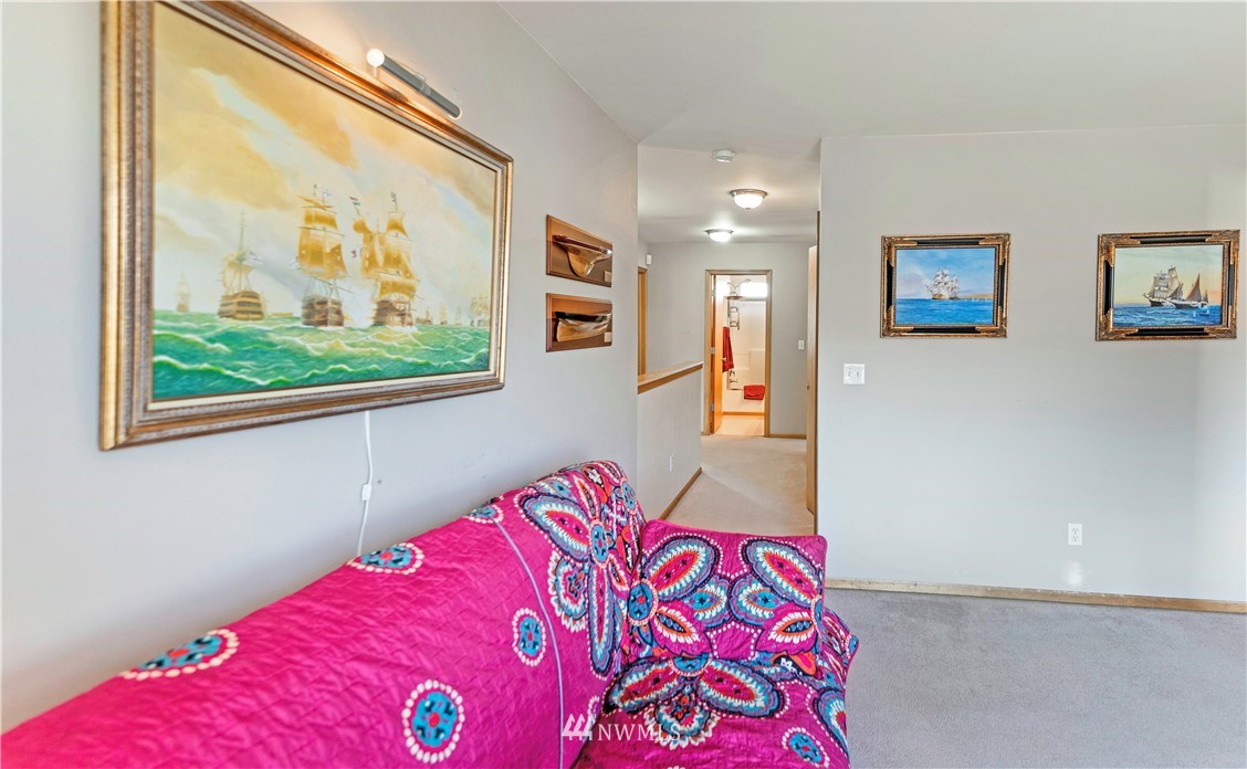 4139 Track Street Bellingham, WA 98226 - Photo 16 of 40 a bedroom with a bed and a painting on the wall