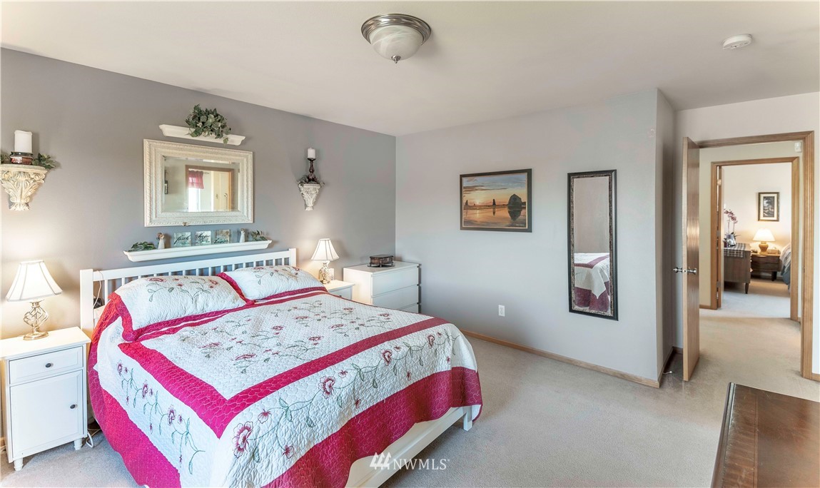 4139 Track Street Bellingham, WA 98226 - Photo 22 of 40 a bedroom with a bed and a table
