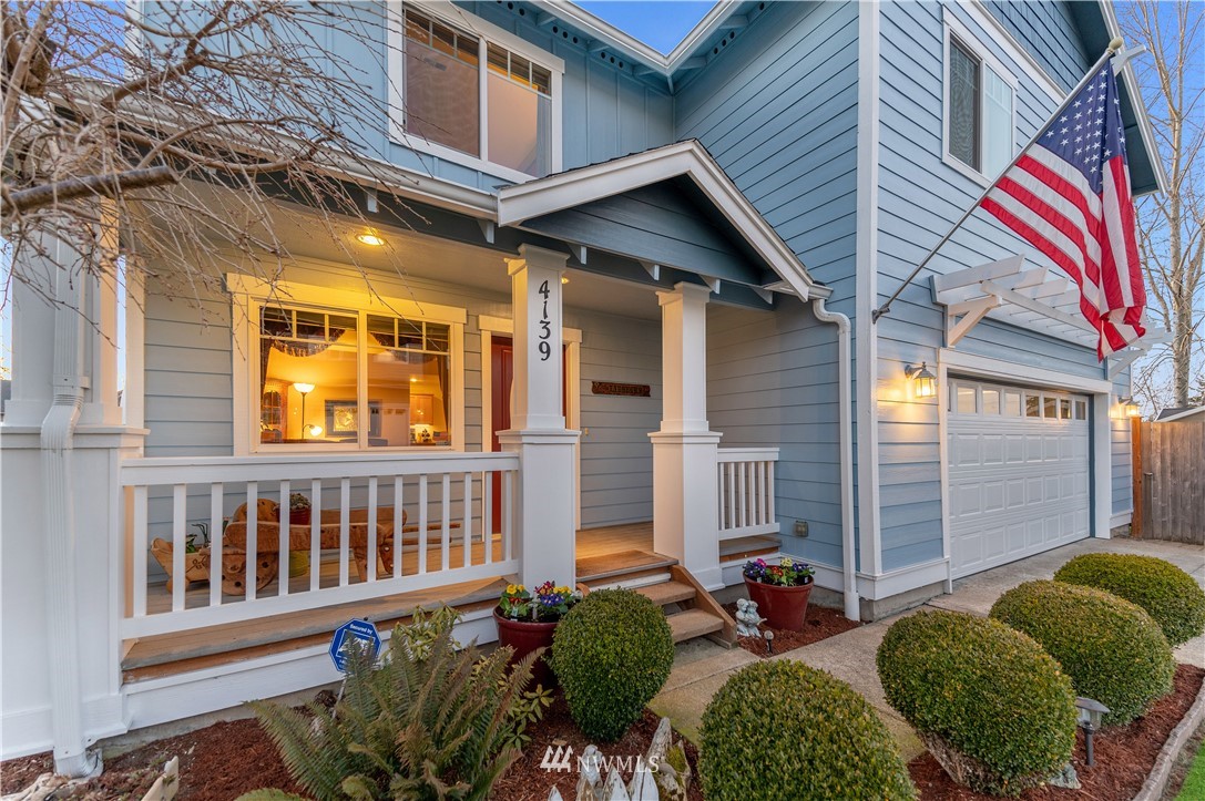4139 Track Street Bellingham, WA 98226 - Photo 32 of 40 a view of a house with a chairs in a patio