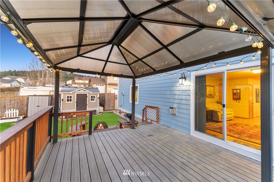 4139 Track Street Bellingham, WA 98226 - Photo 34 of 40 a view of a balcony with furniture and wooden floor
