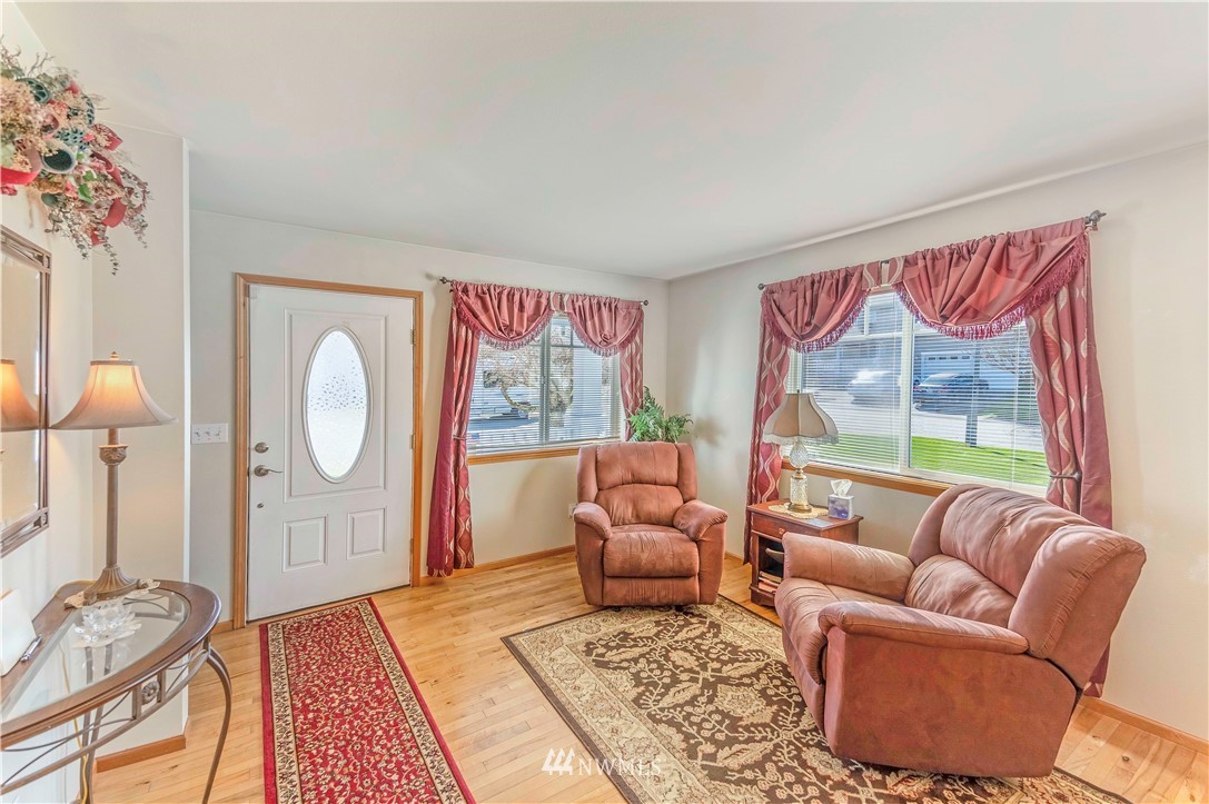 4139 Track Street Bellingham, WA 98226 - Photo 5 of 40 a living room with furniture a table and a large window