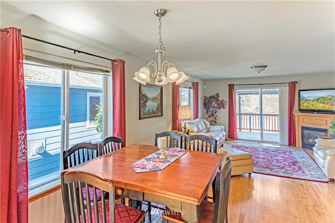 4139 Track Street Bellingham, WA 98226 - Photo 10 of 40 a view of a dining room with furniture window and wooden floor