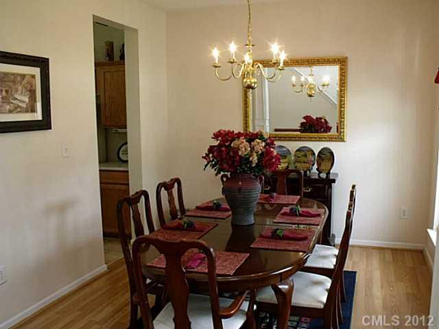 189 Mott Road Mooresville, NC 28115 - Photo 3 of 16 a dining room with furniture and chandelier