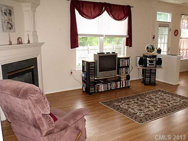 189 Mott Road Mooresville, NC 28115 - Photo 5 of 16 a living room with furniture and a flat screen tv