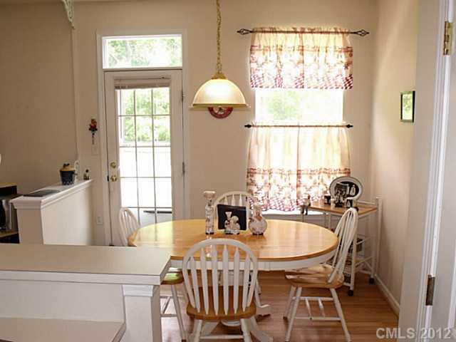 189 Mott Road Mooresville, NC 28115 - Photo 9 of 16 a dining room with furniture and a window