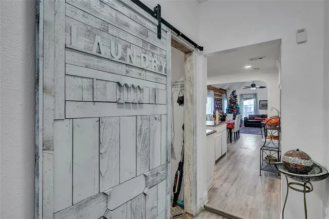 a view of a livingroom with furniture and a gate