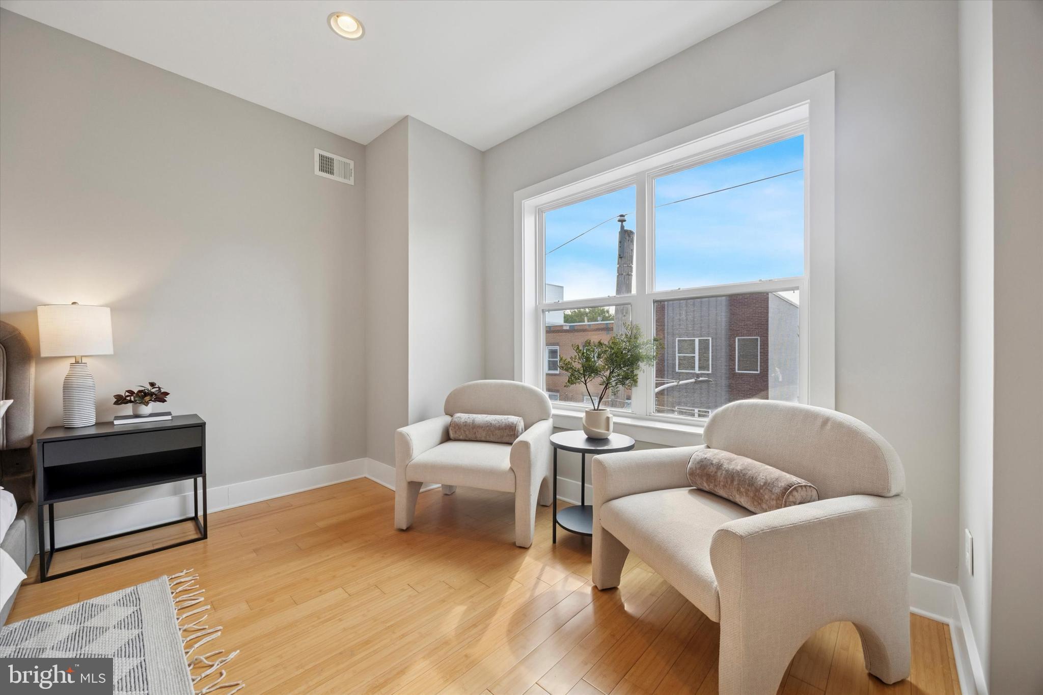 1639 Francis Street Philadelphia, PA 19130 - Photo 15 of 21 a living room with furniture and a next to a window