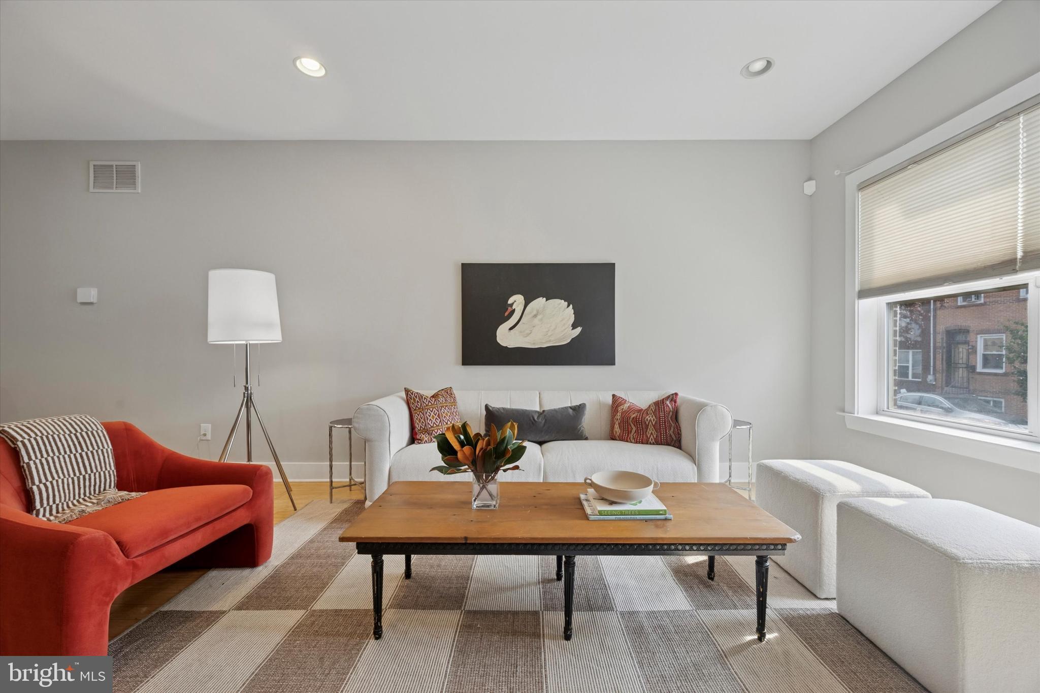 1639 Francis Street Philadelphia, PA 19130 - Photo 5 of 21 a living room with furniture a rug and a lamp