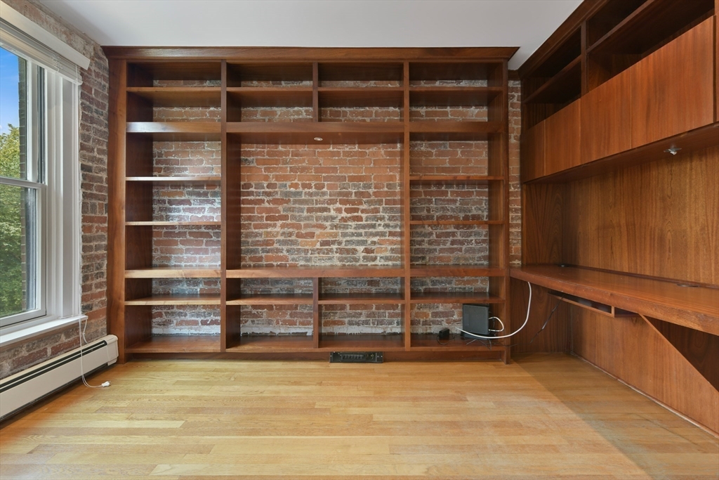 71 Rutland Street, Unit 4 Boston, MA 02118 - Photo 11 of 35 a view of walk in closet with empty racks