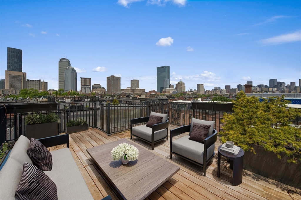 71 Rutland Street, Unit 4 Boston, MA 02118 - Photo 26 of 35 a view of a roof deck with couches