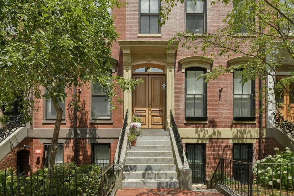 71 Rutland Street, Unit 4 Boston, MA 02118 - Photo 34 of 35 a front view of a building with glass windows
