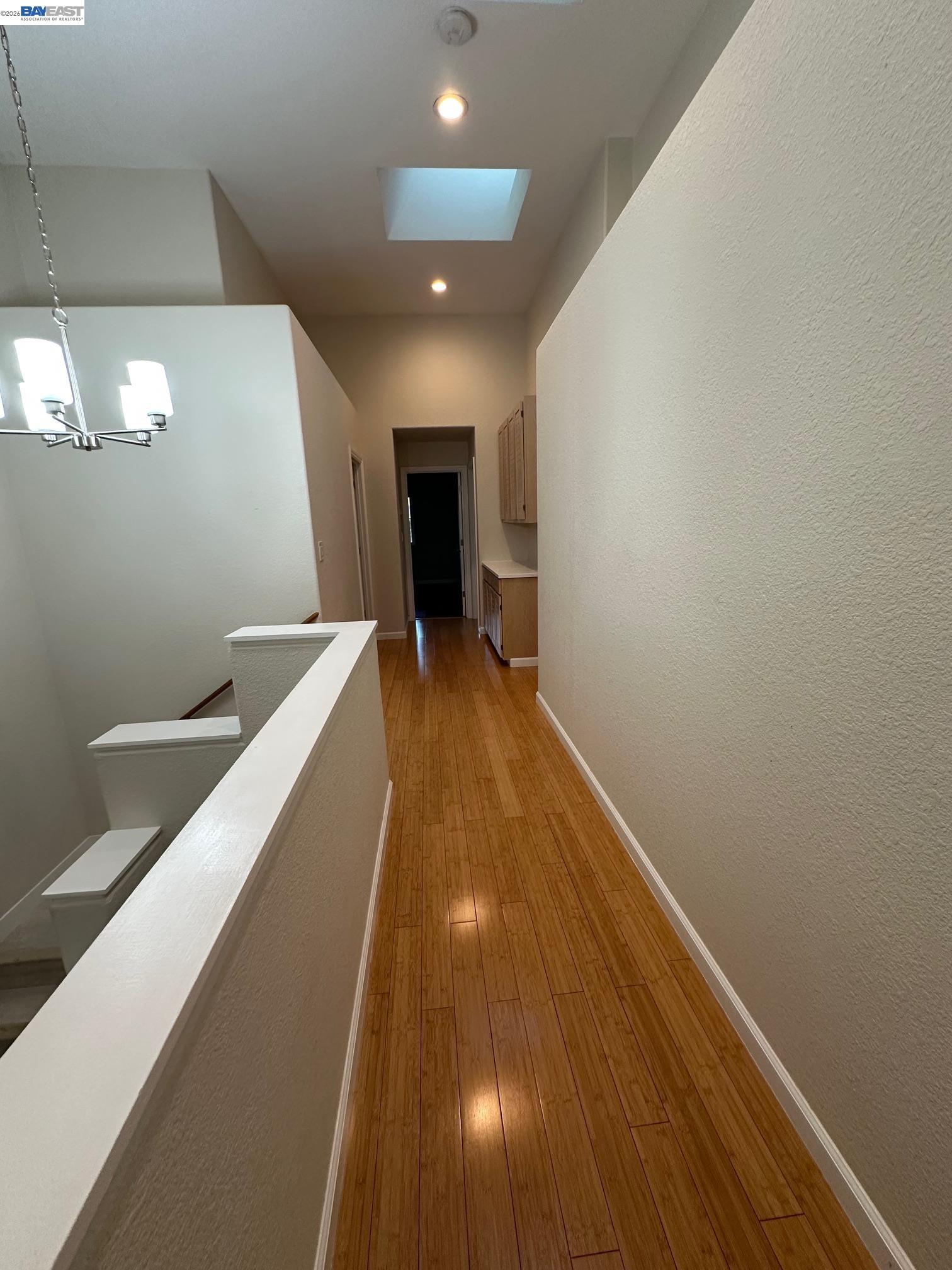 912 Vista Pointe Drive San Ramon, CA 94582 - Photo 11 of 13 a view of a hallway with wooden floor