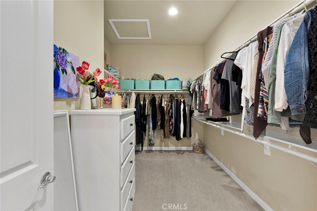 10676 Lanigan Road Apple Valley, CA 92308 - Photo 17 of 37 One of the largest walk in closets of all models in Sun City.