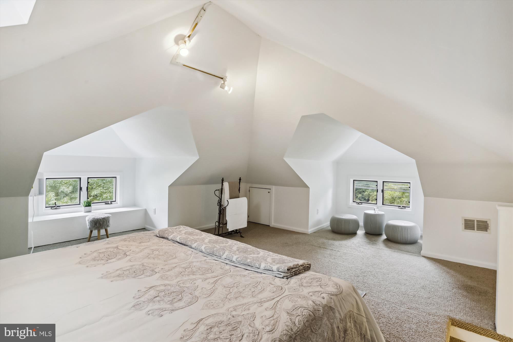 4887 MacArthur Boulevard Northwest Washington, DC 20007 - Photo 21 of 21 Third floor bedroom all carpeted