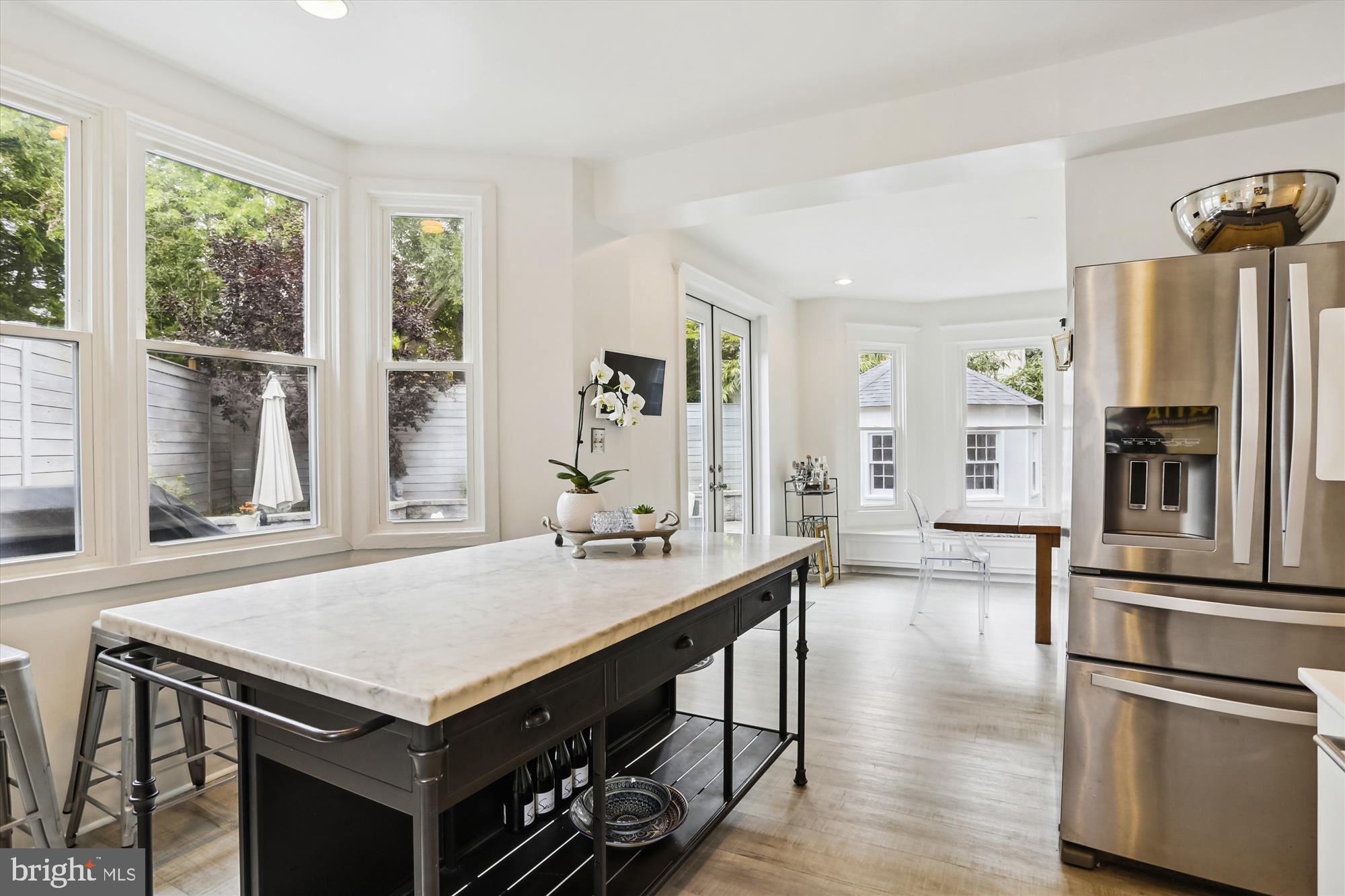 4887 MacArthur Boulevard Northwest Washington, DC 20007 - Photo 9 of 21 The flow from kitchen to DR is wonderful