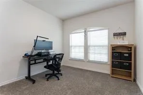 a bathroom with double vanity sink and a mirror