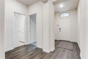 a room with furniture and a window