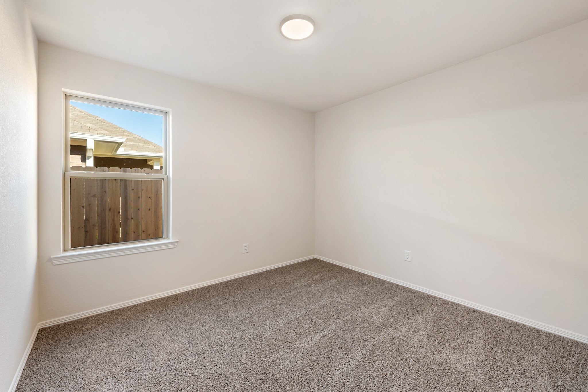 1214 High Street Navasota, TX 77868 - Photo 20 of 28 an empty room with a window