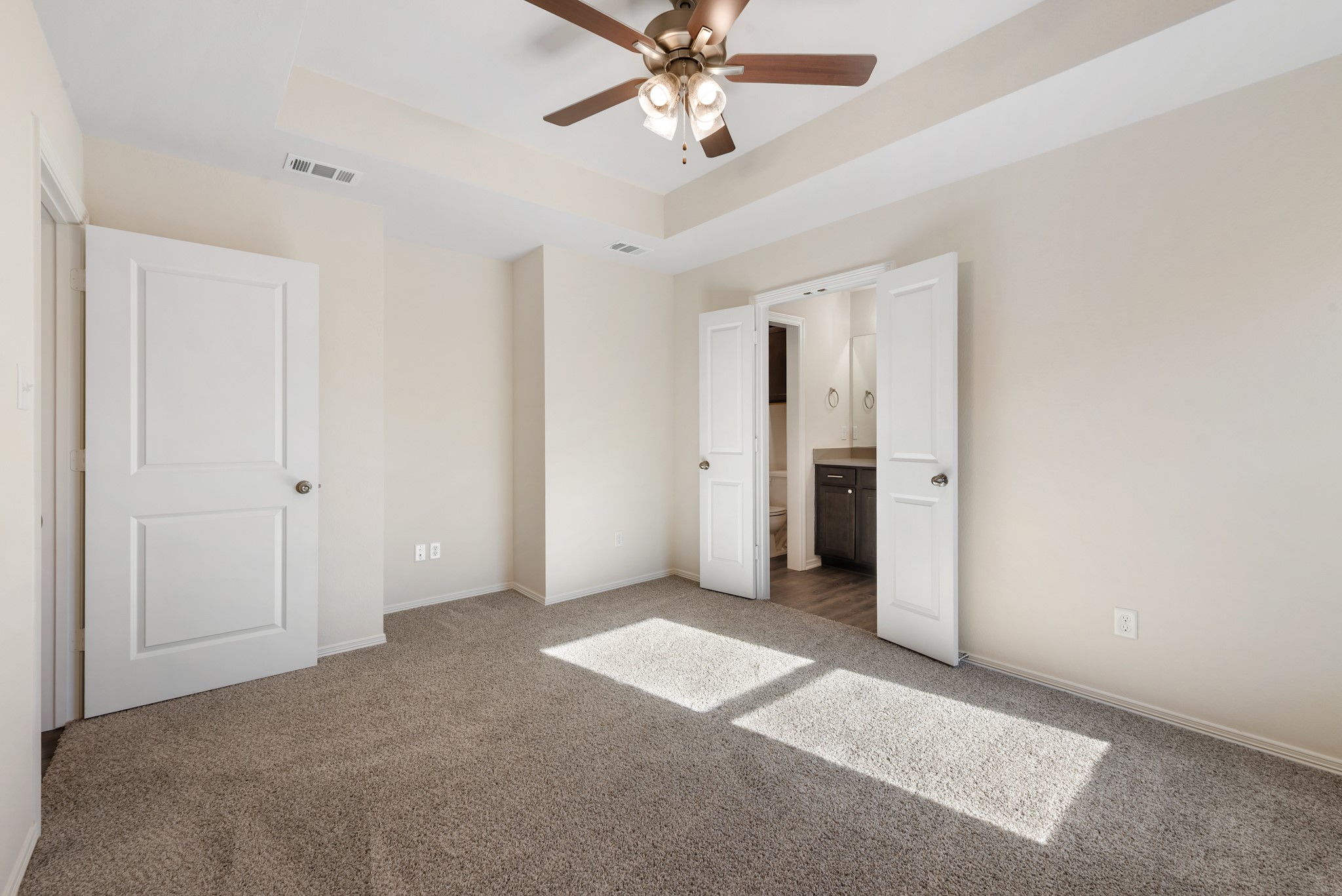 1214 High Street Navasota, TX 77868 - Photo 22 of 28 a view of an empty room with a ceiling fan