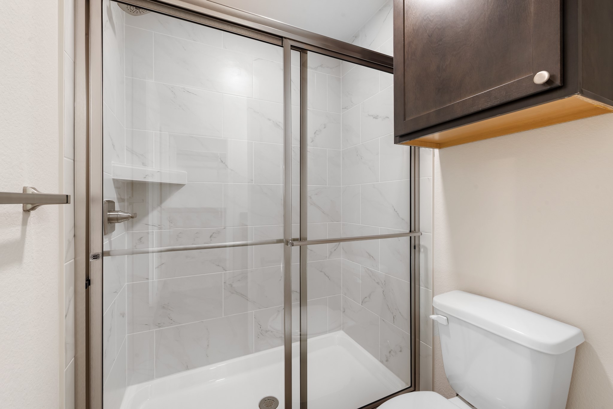 1214 High Street Navasota, TX 77868 - Photo 25 of 28 a bathroom with a shower and a toilet