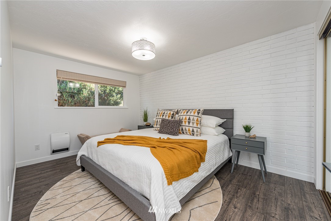 271 3 Crabs Road Sequim, WA 98382 - Photo 16 of 40 a bedroom with a bed and a window