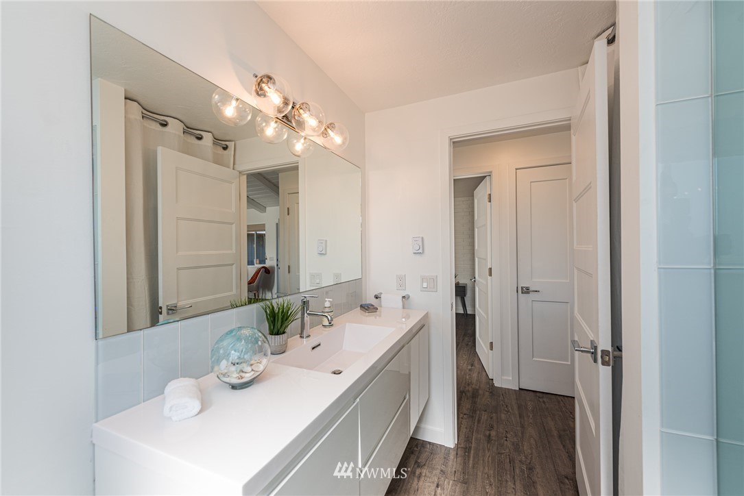 271 3 Crabs Road Sequim, WA 98382 - Photo 18 of 40 a spacious bathroom with a double vanity sink mirror and double