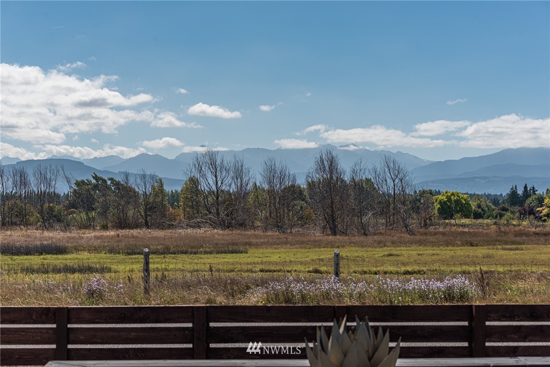 271 3 Crabs Road Sequim, WA 98382 - Photo 3 of 40 a view of a yard with an outdoor space