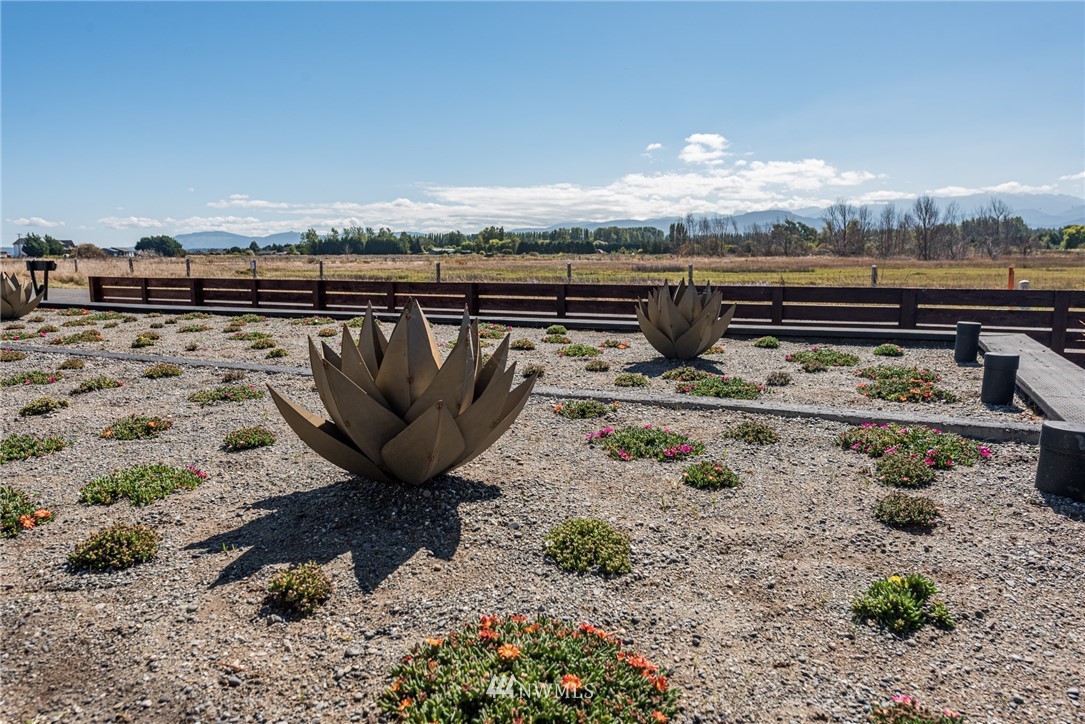 271 3 Crabs Road Sequim, WA 98382 - Photo 21 of 40 a view of a lake with a terrace